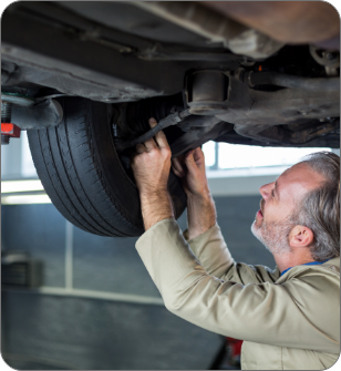 mechanic-servicing-car